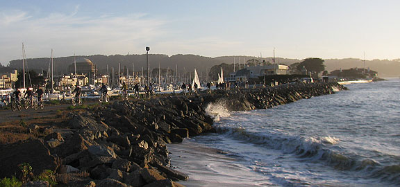 Riding on the breakwater behind teh St. Francis Yacht Club to get to the Wave Organ.